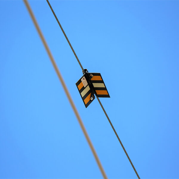 bird flight diverter installed on an active utility line.